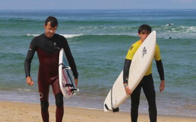 Coach versus prof de surf